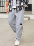 Men's Fleece Lined Jogger Pants, Casual Drawstring Waist Sweatpants with Pockets, Warm Running Trousers for Fall & Winter