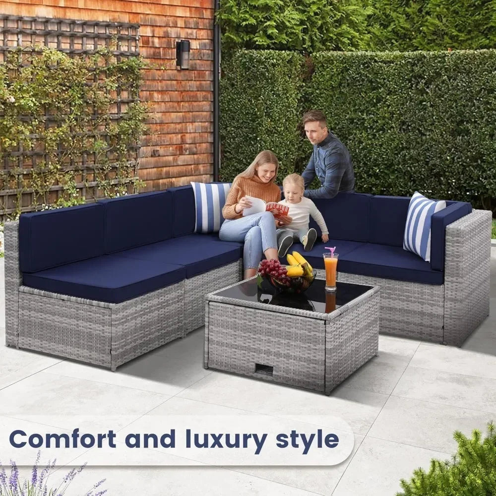 8-piece Outdoor Rattan Patio Furniture Segmented Set, Glass-topped Table with Hidden Storage, Grey Rattan with Blue Padded Mats