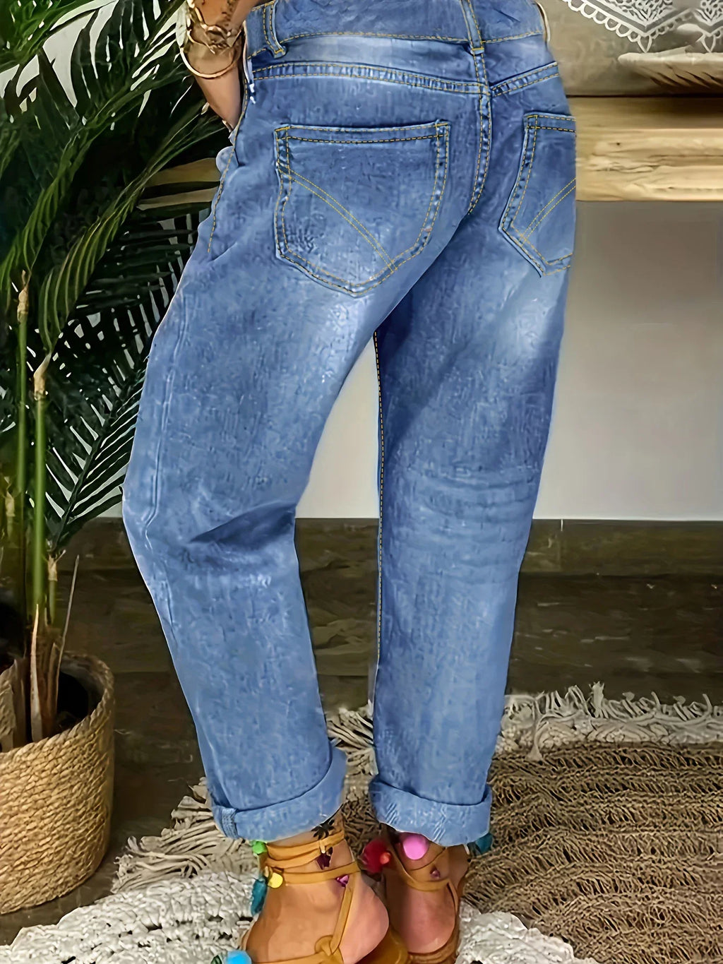 Plus-size women's high-waisted stretch jeans with multiple buttons, distressed jeans, street style